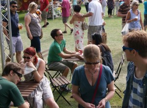 Probably a coincidentally large number of people wearing sunglasses in one picture. some are also eating toasties at the brand new Jabberwocky tables. 