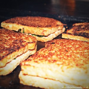 Four toasties crisping up on the presses. Fun Fat: the salmon toastie scored 8.5 out of 10.