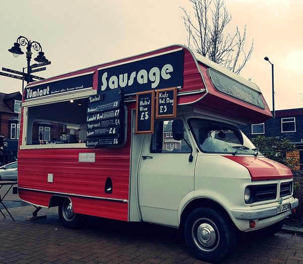 Yumlaut trading in the Bedford van on a rainy day.