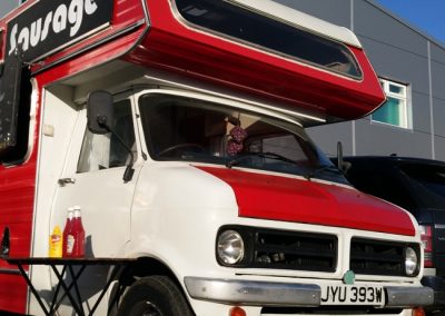Our red and white Bedford van